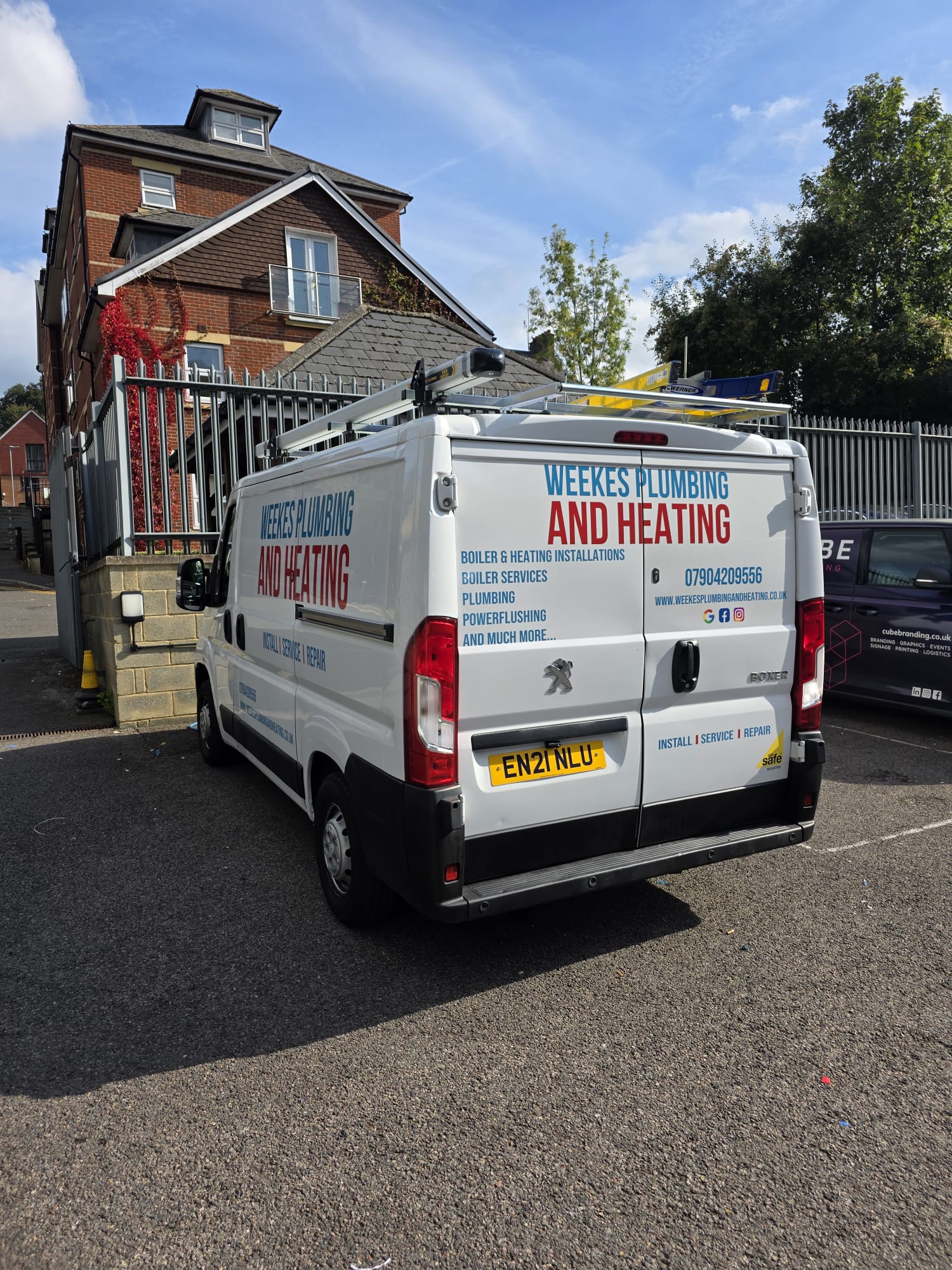 Weekes Plumbing & Heating Gas Safe sign-written Peugeot Boxer service van parked in Surrey